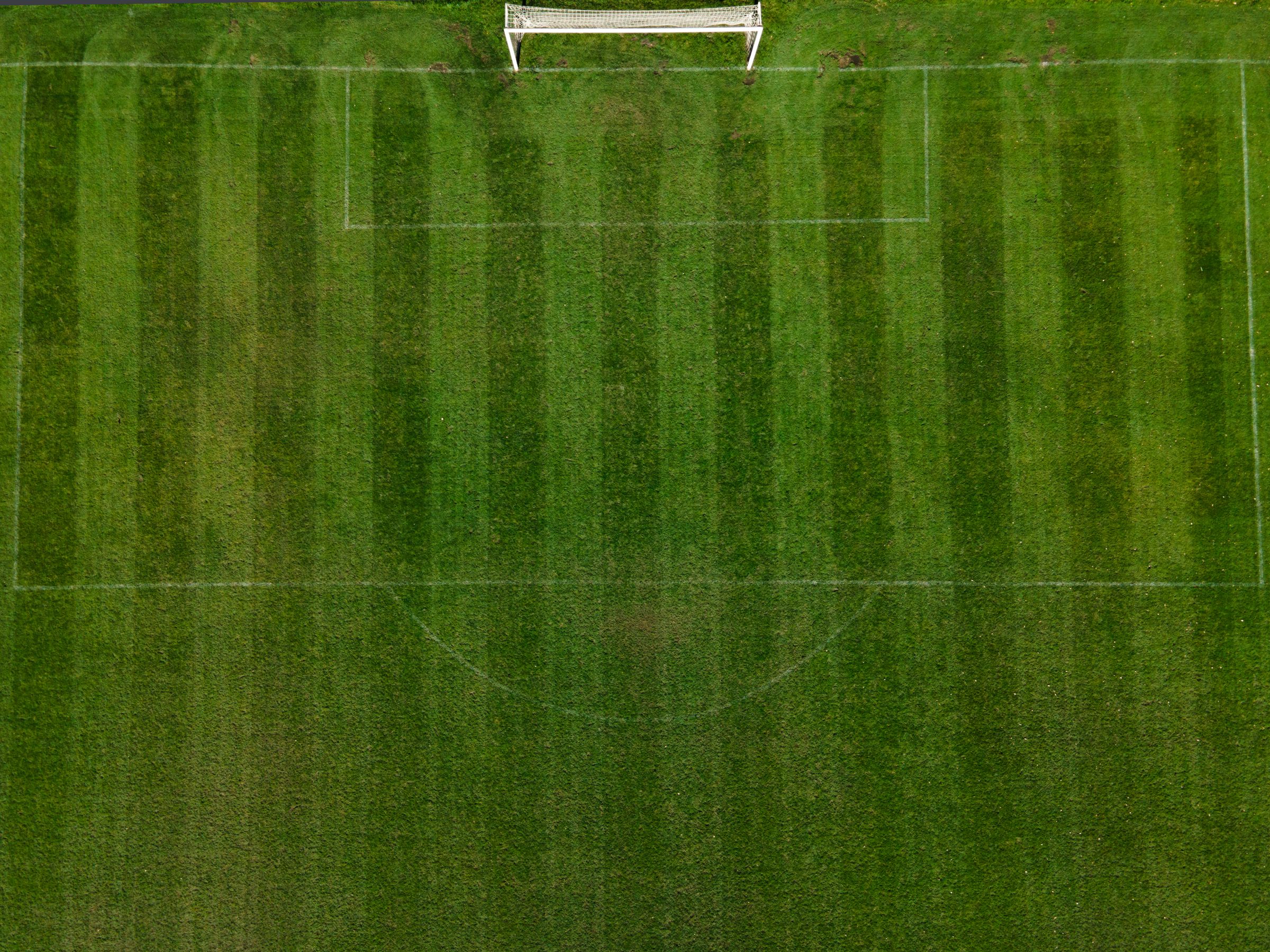 Aerial view of manicured grounds maintained by an autonomous fleet