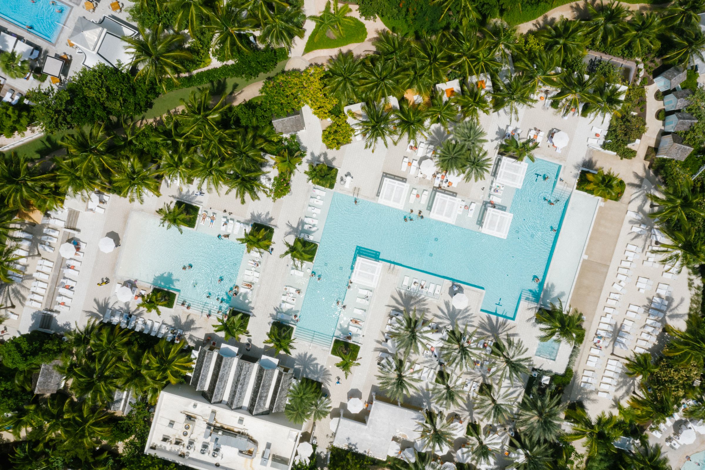 Overhead view of a resort pool cleaned by an autonomous unit